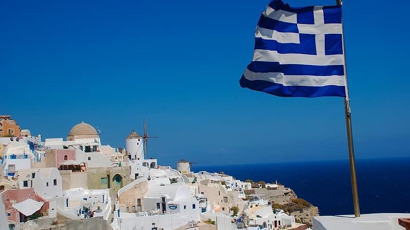 Bandeira e vista da Grécia